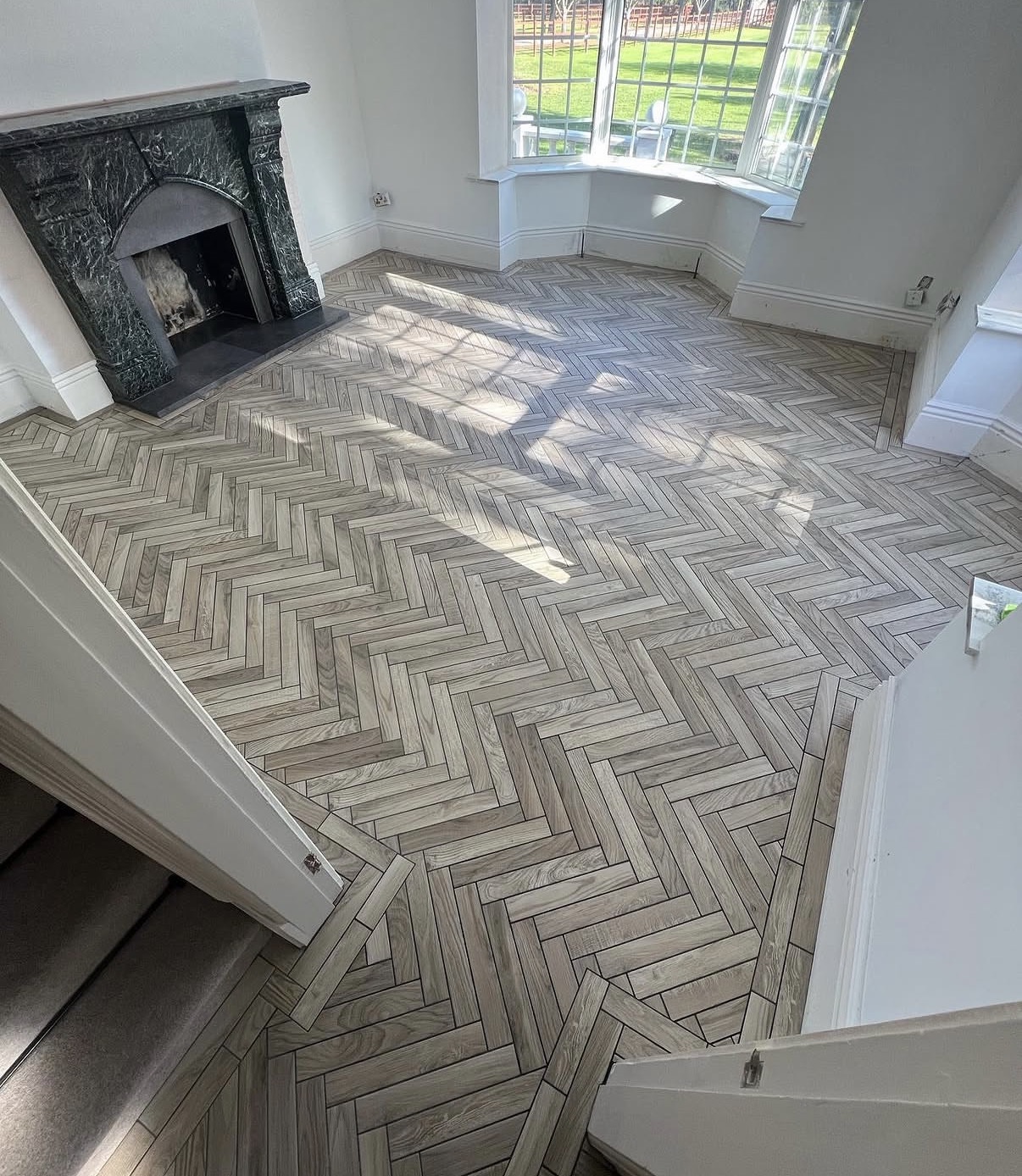 Herringbone wood-effect floor
